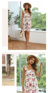 Detail of white floral summer dress with red rose print, square neck and ruffle straps