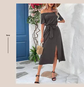 Detail of off-the-shoulder dark grey midi dress with waist tie and side slit detail