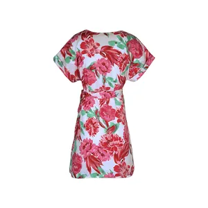 Detailed back view of a floral summer dress featuring a waist tie and red flower print