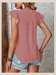 Detail of red and white striped top with ruffle cap sleeves and distressed denim shorts