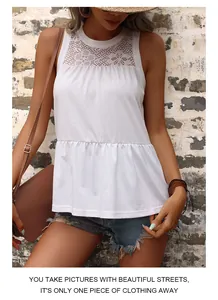 Detailed view of white sleeveless top with floral lace patchwork and peplum hem design