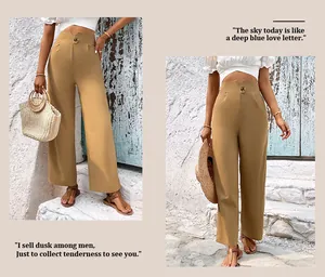 Detail of high waist trousers featuring a V-shaped waistband and single button closure