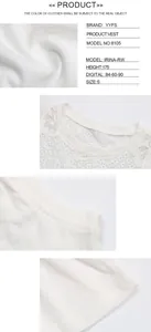 Close-up of white sleeveless vest featuring delicate hollow lace stitching and fabric texture