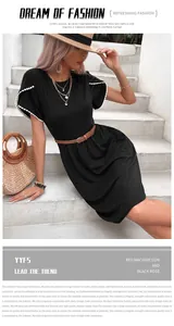 Détail de la robe t-shirt noire avec manches en dentelle blanche et ceinture tressée