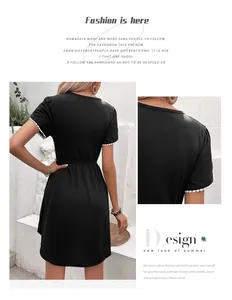 Détail de la robe d'été noire avec bordure en dentelle blanche sur les manches pétales