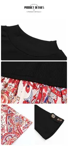 Détail du tissu en maille côtelée, motifs paisley et poignets décoratifs à double bouton