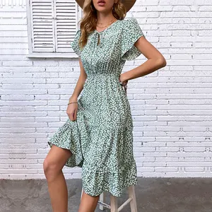 Short sleeve green floral maxi dress with V-neck and tiered skirt for summer style