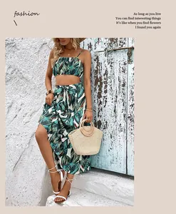 Detail of summer vacation set with crop top and tropical leaf print maxi skirt
