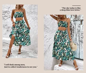 Detail of summer two-piece set featuring tropical palm leaf print and lace-up maxi skirt