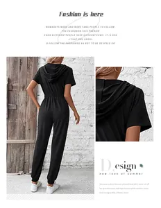 Détails d'un combishort noir à capuche avec taille élastique et tissu texturé de qualité
