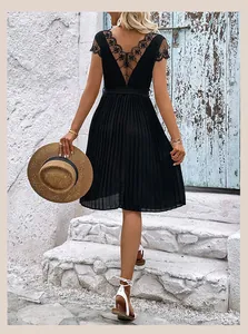 Detail of summer dress featuring lace拼接 back and fine pleated texture in black