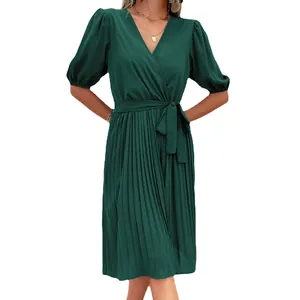 Elegant deep green V-neck pleated wrap dress with short puff sleeves and waist tie