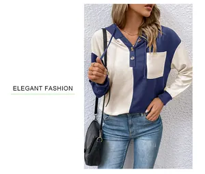 Dettaglio del tessuto a nido d'ape e felpa bicolore con scollo Henley e bottoni