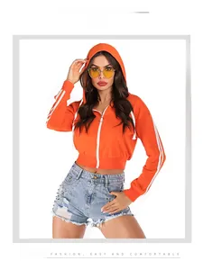 Detail of cropped orange zip-up hoodie with white stripes and metallic zipper puller