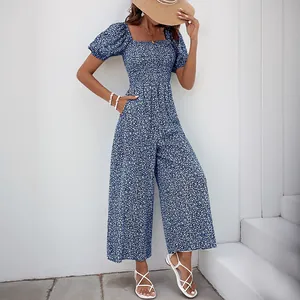 Combinaison fleurie marine à col carré et manches bouffantes avec pantalon large fluide