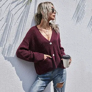 Women's burgundy confetti knit V-neck cardigan with white buttons and side pockets