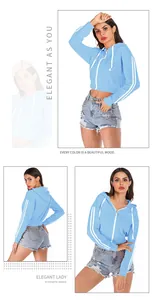 Detail view of light blue cropped zip-up hoodie featuring white double sleeve stripes