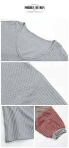 Detail view of V-neck grey waffle knit sweater with burgundy color block sleeve cuffs