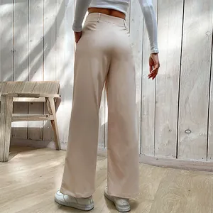 Pantalon femme taille haute crème à jambes larges avec un design fluide et style minimaliste