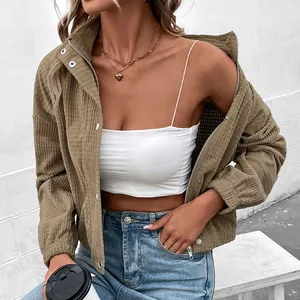 Detail of khaki waffle texture fabric on women's high-neck short jacket with zipper