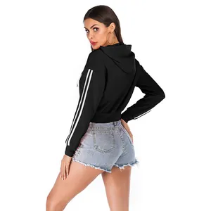 Women's black cropped hoodie with white striped sleeves and a slim fit casual design