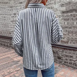 Relaxed women's long sleeve striped shirt with back pleat detail and classic lapel collar