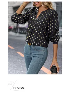 Detail of V-neck long sleeve blouse featuring golden rhombus pattern and satin texture