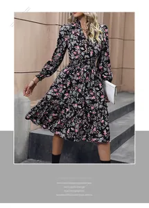 Detail of V-neck buttons and floral pattern on long sleeve tiered ruffle midi dress