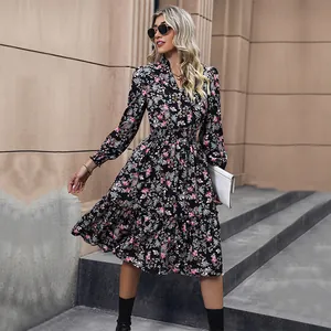 Floral V-neck long sleeve midi dress with elastic waist and ruffled hem in black