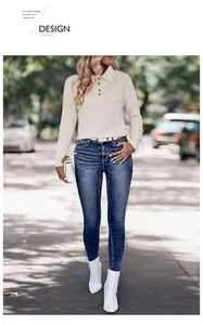 Close-up of cream textured knit Polo shirt with long sleeves and dark buttons details