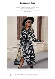 Detail of long sleeve shirt dress with black and white abstract print and waist tie