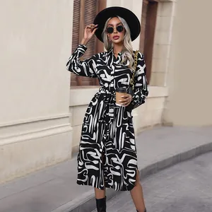 Fashionable black and white graffiti print long sleeve midi dress with belt
