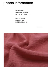 Detail showing high-quality brick red cotton linen fabric texture for summer shorts