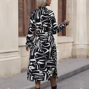 Chic black and white printed long sleeve shirt dress with belt and side slit detail