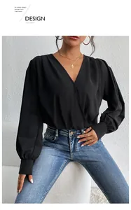 Detail of elegant black deep V-neck surplice bodysuit with cuffed long sleeves