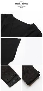 Detail view of the black bodysuit showing the cross V-neckline and bottom snap closures