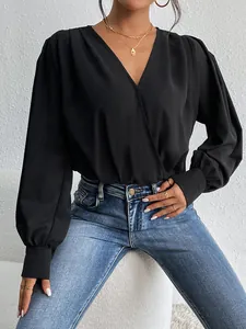 Elegant black V-neck wrap bodysuit with long lantern sleeves for women’s formal commute