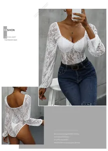 Macro shot of white floral lace fabric and U-neck detail on long sleeve bodysuit