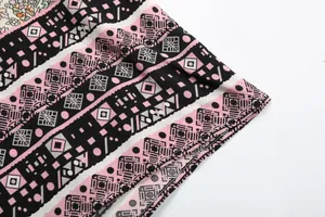 Close-up of bohemian floral print and geometric patterns on high-quality woven fabric