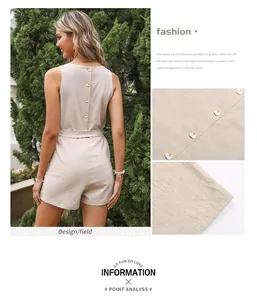 Detail of apricot romper showing wood buttons on back and textured linen blend fabric