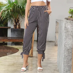 Women high waist black and white striped cropped pants with bow ties at cuffs