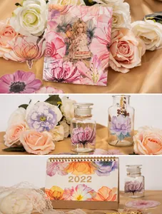 Floral PET stickers and anime girl decals decorating glass bottles and 2022 calendars