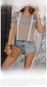 Detail of brown t-shirt with white lace panels and vintage leg-of-mutton puff sleeves