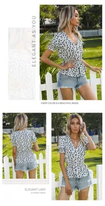 Detail of V-neck floral blouse with ruffled sleeves and peplum hem in summer garden setting