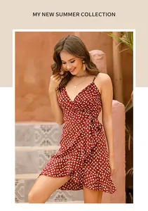 Detail of red floral wrap dress with ruffle hem and V-neckline for summer beach vacation