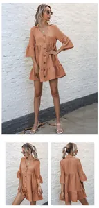 Detailed views of terracotta babydoll dress with ruffle hem and textured fabric
