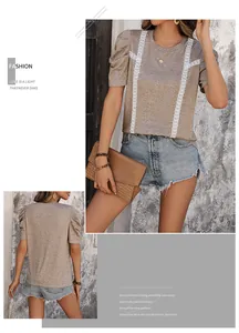 Detail view of khaki lace-stitched T-shirt featuring retro puff sleeves and embroidery
