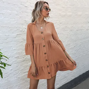 Women V-neck button down puff sleeve babydoll dress in apricot orange color