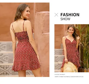 Detail of red floral spaghetti strap dress with ruffled hem and slim waist design