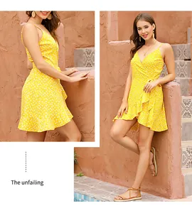 Detail of yellow floral wrap dress featuring V-neckline and ruffles for summer
